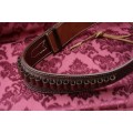 Cowboy belt and holster . Genuine leather