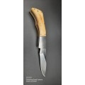 Hasnd made Andre Schoeman folder pocket knife with hisa unique Bolster lock