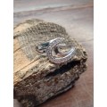 Sterling silver ladies ring Size: O