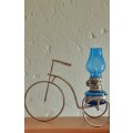 Vintage Small oil lamp- blue glass in a pretty bicycle stand