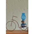 Vintage Small oil lamp- blue glass in a pretty bicycle stand