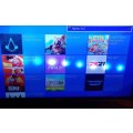Sony PlayStation 4 Slim 1Tb, with 2 Bluetooth Wireless Controllers and 9 Games