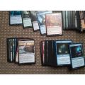 Magic The Gathering: Lot of assorted cards including lands and 5 rares