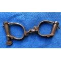 Very old handcuffs with key