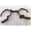 Very old handcuffs with key