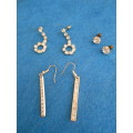 3 pair of faux diamond earrings