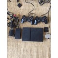 SONY PLAYSTATION 2 SLIM CONSOLE WITH 11 GAMES, 2 WIRED CONTROLS & EYE TOY