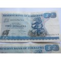 2 X ZIMBABWE $2 NOTES - BIRD WATERMARK = 1 BID FOR BOTH