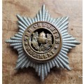 The Cheshire Regiment Bi Metal Cap Badge with slide