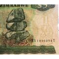 Zimbabwe $5 Dollars - Long neck Bird