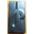Abstract Black Stone relief Sculpture signed in metal frame - 1967