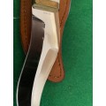 KNIFE WITH CARVED WARTHOG IVORY HANDLE