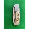 STAINLESS STEEL FOLDING KNIFE WITH ALIGATOR SKIN