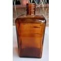 The JR Watkins Co amber glass medicine bottle