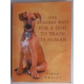One hundred ways for a dog to train its humans by Simon Whaley