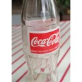 Coca-Cola bottle © 2002