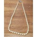 String of Faux Pearls with Silver 835 Clasp