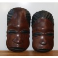 Pair of Hand Carved Male and Female Wooden Masks