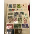 Book with collection of 286 Olympic games stamps
