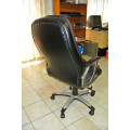 Comfortable Office Chair tilts and swivels on casters in good condition