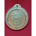 GOLD-PLATED MEDAL