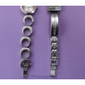 1 Lot Ladies Watches Working Condition, 1 x Ricardo With Pink Face, 1 x L`S Watch With Grey Face