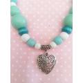 Cheri Necklace,  Green And White Wooden Beads With Nickel Heart Pendant On Velvet Leather Cord, 1pc