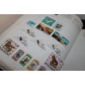 2 Books of Stamps 2500 plus assorted stamps
