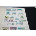 Stamp Album with Assorted Stamps