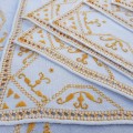Set of linen mats with gold embroidery - 1 large, 6 medium, 1 small