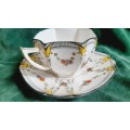 Shelley teacup and saucer 6,5cm high and 13 cm diameter - hairline cracks