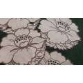 Four small embroidered linen doilies or coasters - 15cm
