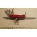 Victorinox - Craftsman Swiss Army Knife with Red Scales