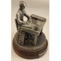 Figurine of Cigar Maker Cast Iin Pewter with wooden Base Circa 1950
