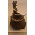 Bronze colour African lady with cooking pot and spoon