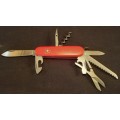 Victorinox Swiss Army knife (Huntsman)Older model Grooved Cork screw Orange/Red scales