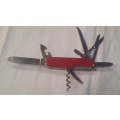 Victorinox Swiss Army knife (Huntsman)Older model Red scales Grooved cork screw Logo on scale