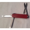 Swiss Army Knife .Victorinox- Classic Red Scales 58 mm older model sak logo faded
