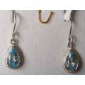 Sterling Silver and Pear Blue Topaz Earrings