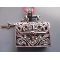 925 Sterling Silver  and Genuine Garnet `purse `/ Pendant