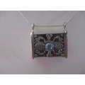 925 Sterling Silver and Bllue Topaz `Purse`/ Pendant on Strling Chain .