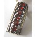 925 Sterling Silver and Garnets Pendant .