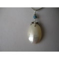925 Sterling Silver Shell and Genuine Turquoise Pendant.