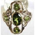 925 Sterling Silver and Peridots Ring.