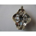 925- Sterling Silver and Blue Topaz Pendant.