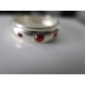 solid,  Sterling Silver  and Genuine Garnets Ring.