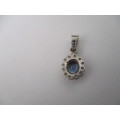 9 ct White Gold , Blue Topaz and Seed Pearls Pendant