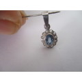 9 ct White Gold , Blue Topaz and Seed Pearls Pendant