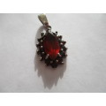 925 Sterling Silver and Genuine Garnets Pendant
