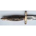 two collectable letter openers Toledo with dragon on handle and s steel made in Japan with knife